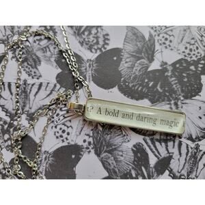 Bold and Daring Magic pendant necklace made with From Bad to Cursed book pages